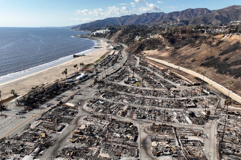 An aerial view shows the devastation left by the Palisades Fire in the Pacific Palisades section of Los Angeles, Monday, Jan. 27, 2025. 