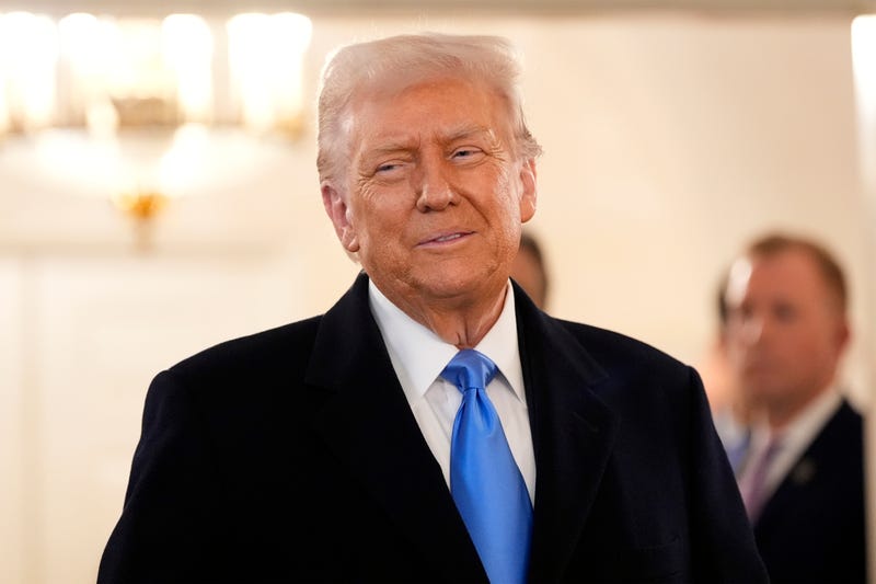 President Donald Trump arrives to greet Marc Fogel at the White House, Tuesday, Feb. 11, 2025, in Washington