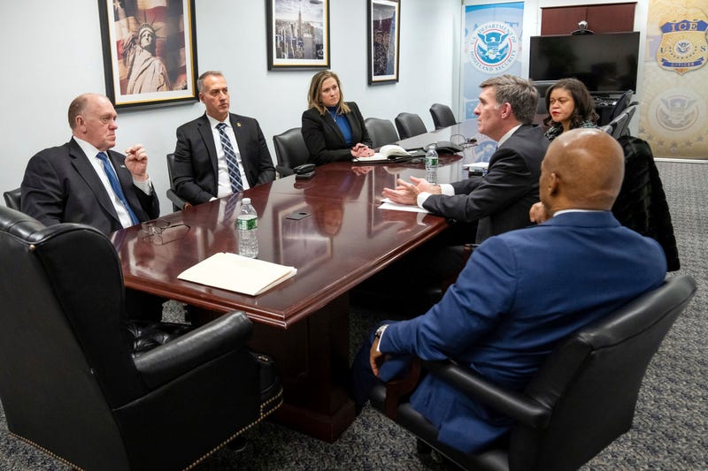 This image provided by Office of the Mayor of New York shows President Donald Trump's border czar Thomas Homan, left, and New York Mayor Adams, right, and others, meeting in New York, Thursday, Feb. 13, 2025