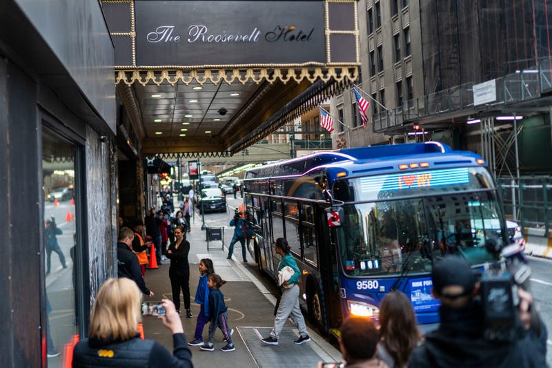 Asylum seekers arrive at the Roosevelt Hotel on Friday, May 19, 2023, in New York.