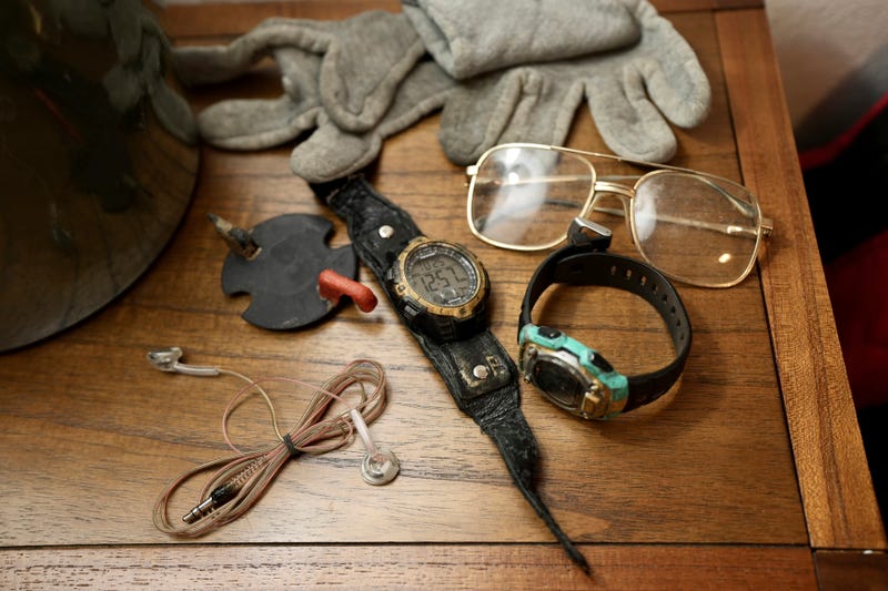 The eyeglasses and watches Leonard Peltier brought home from prison sit on his nightstand in Belcourt, N.D, on Tuesday, Feb. 25, 2025.
