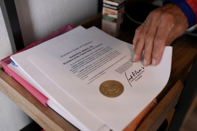 Leonard Peltier holds a copy of his commutation in Belcourt, N.D, on Tuesday, Feb. 25, 2025.