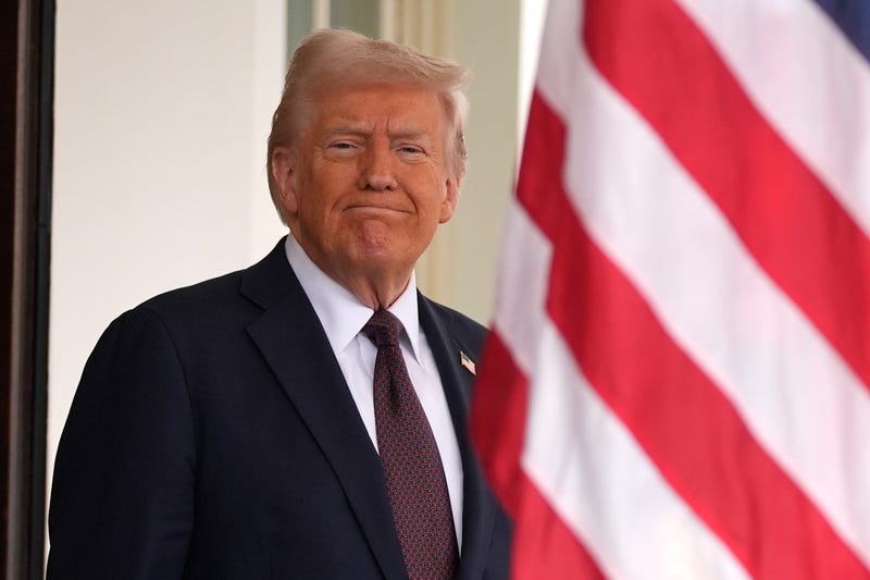 President Donald Trump stands before British Prime Minister Keir Starmer arrives at the White House, Thursday, Feb. 27, 2025, in Washington. 