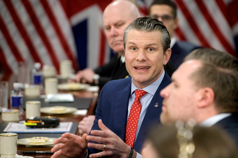 Secretary of Defense Pete Hegseth responds to questions from reporters during a meeting with Britain's Defense Secretary John Healey at the Pentagon, Thursday, March 6, 2025, in Washington