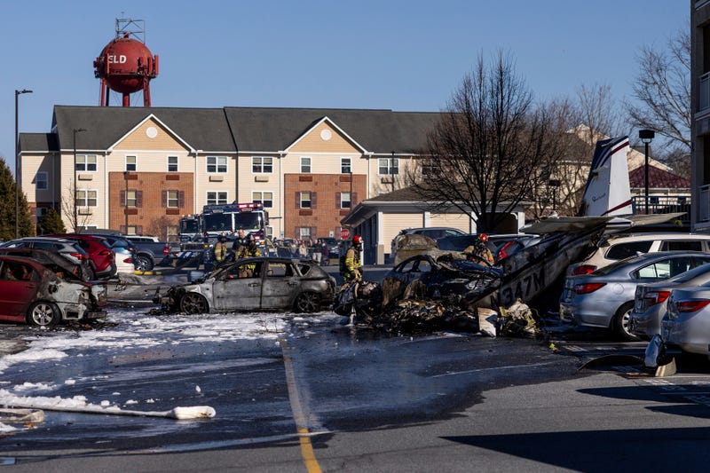 First responders work the scene after a plane crashed in the parking lot of a retirement community in Manheim Township, Pa., on March 9, 2025.