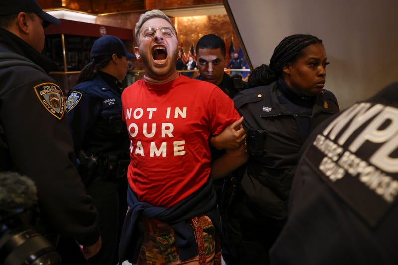 New York Police officers arrest a demonstrator from the group, Jewish Voice for Peace, who protested inside Trump Tower in support of Columbia graduate student Mahmoud Khalil, Thursday, March 13, 2025, in New York