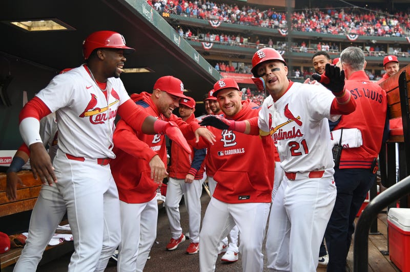 St. Louis Cardinals' Lars Nootbaar (21) celebrates with teammates after hitting a two run homerun during the second inning of an opening-day baseball game against the Minnesota Twins on Thursday, March 27, 2025 in St. Louis