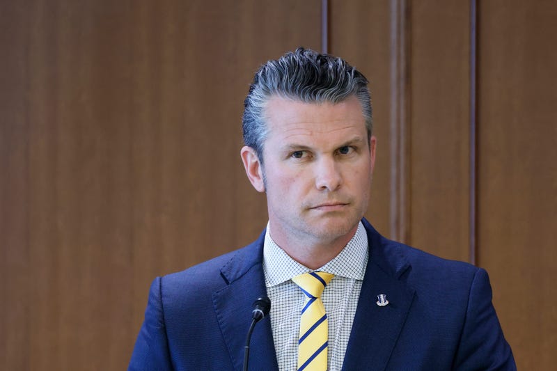 U.S. Secretary of Defense Pete Hegseth attends a joint news conference with Japan's Defense Minister Gen Nakatani at the Ministry of Defense in Tokyo Sunday, March 30, 2025.