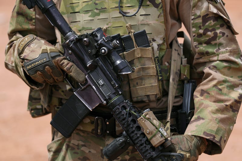 A member of the U.S. Army 212 Infantry 2nd Brigade stands next to the US-Mexico border as part of Joint Task Force Southern Border Thursday, April 3, 2025, in Douglas, Ariz.