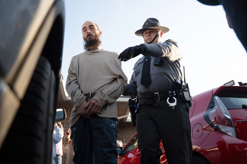 Cody Balmer is escorted from court after his preliminary arraignment on Monday, April 14, 2025, in Harrisburg, Pa.