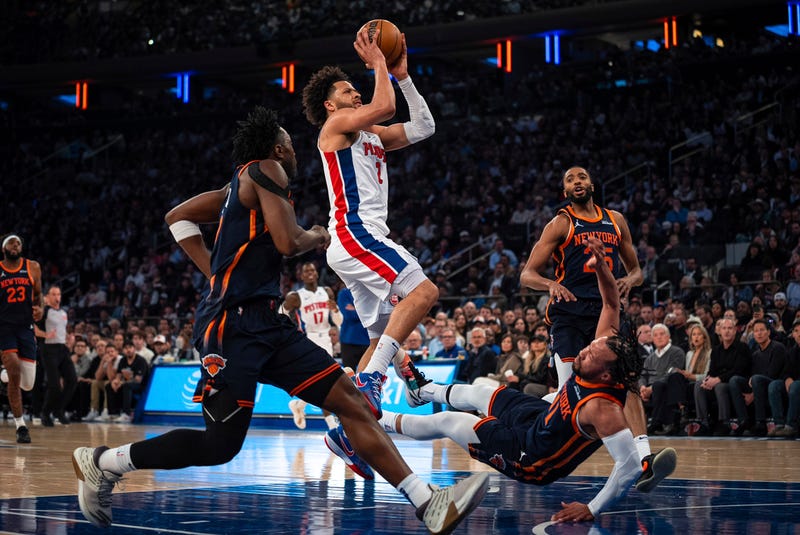 Detroit Pistons guard Cade Cunningham scores and knocks down New York Knicks guard Jalen Brunson