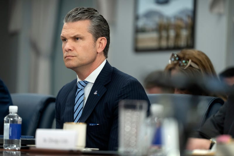 Secretary of Defense Pete Hegseth listens during a meeting with Peru's Foreign Affairs Minister Elmer Schialer and Peru's Minister of Defense Walter Astudillo at the Pentagon, Monday, May 5, 2025, in Washington. 
