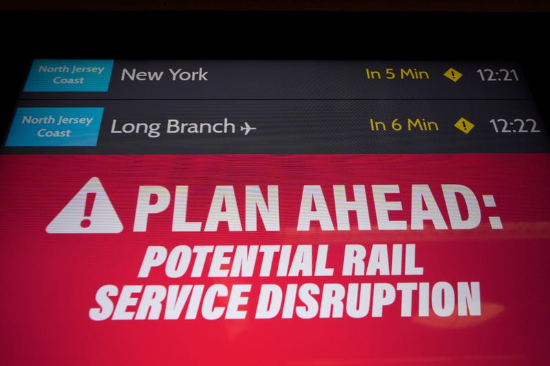 An electronic display advises commuters of potential NJ Transit service disruptions at the Secaucus Junction station in Secaucus, N.J., May 14, 2025.