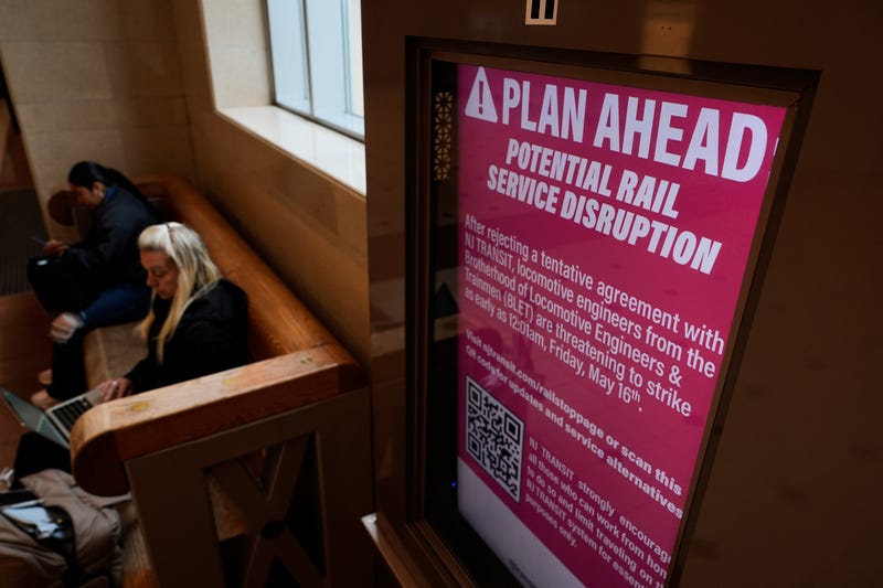 An electronic display advises commuters of potential NJ Transit service disruptions at the Secaucus Junction station in Secaucus, N.J., May 14, 2025.
