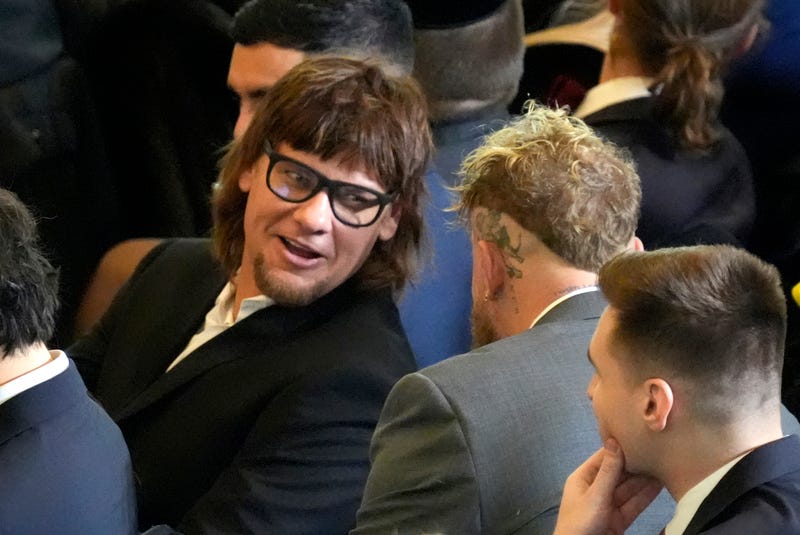 FILE - Theo Von, left speaks with Jake Paul in Emancipation Hall at the 60th Presidential Inauguration, Jan. 20, 2025, at the U.S. Capitol in Washington.
