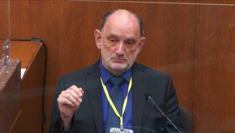 Dr. David Fowler, a retired forensic pathologist and former chief medical examiner for the state of Maryland testifies as Hennepin County Judge Peter Cahill presides, on April 14, 2021, in the trial of former Minneapolis police Officer Derek Chauvin at the Hennepin County Courthouse in Minneapolis, Minn. Chauvin is charged in the May 25, 2020 death of George Floyd. 