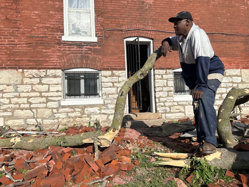 Greg Simmons, 55, a St. Louis resident, surveyed damage after a storm ripped the roof off of his home on Friday, May 16, 2025.