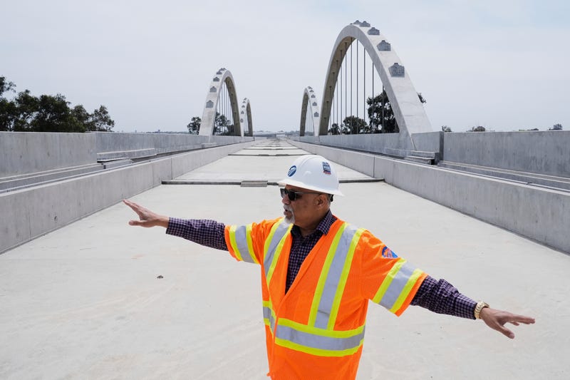 FILE - Garth Fernandez, Central Valley regional director for the California High-Speed Rail Authority, talks about the Cedar Viaduct in Fresno, Calif., April 15, 2025.