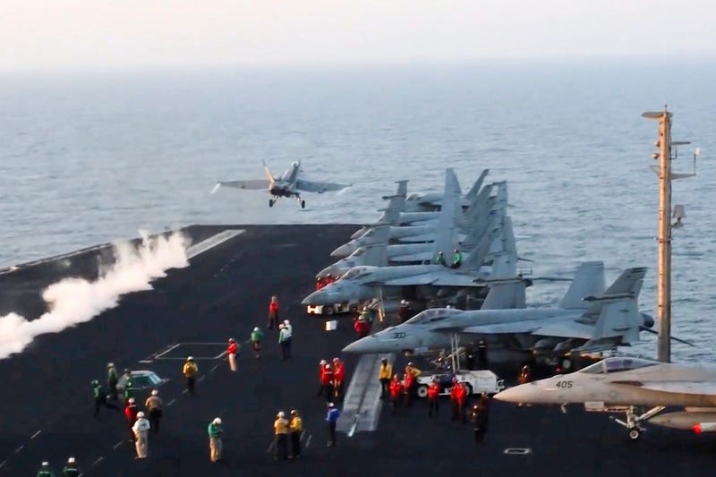 FILE - This image taken from video provided by the U.S. Navy shows an aircraft launching from the USS Harry S. Truman in the Red Sea before airstrikes in Sanaa, Yemen, March 15, 2025.