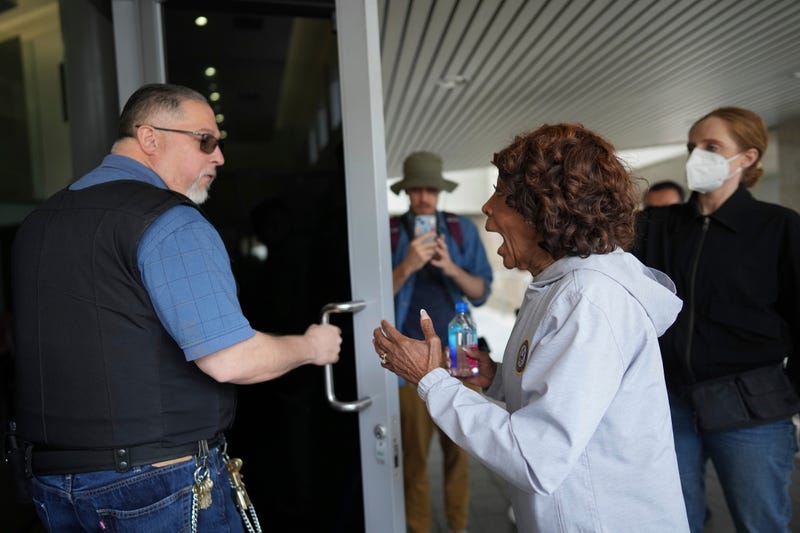U.S. Rep. Maxine Waters, D-Calif., tries to enter the Federal Bureau of Prisons in downtown Los Angeles, Sunday, June 8, 2025, following last night's immigration raid protest.