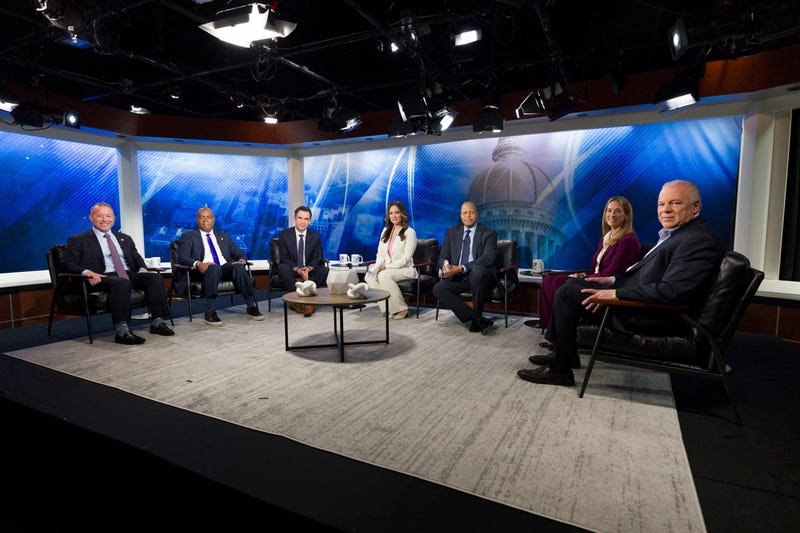 From left: New Jersey Rep. Josh Gottheimer; Newark Mayor Ras Baraka; Jersey City Mayor Steve Fulop; moderator NJ Spotlight News anchor Briana Vannozzi; moderator WNYC Morning Edition host Michael Hill; New Jersey Rep. Mikie Sherrill; and former state Senate President Steve Sweeney attend the New Jersey Democratic gubernatorial primary debate on May 12, 2025, in Newark, N.J.