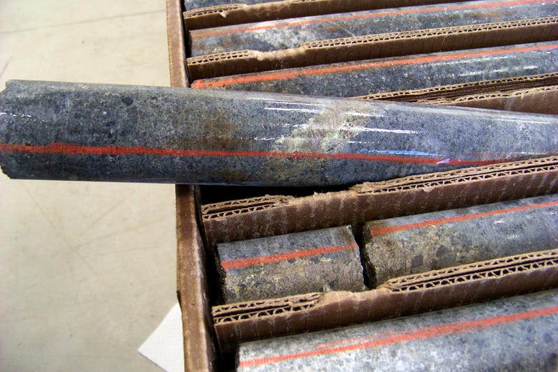 A core sample drilled from underground rock near Ely, Minn., shows a band of shiny minerals containing copper, nickel and precious metals, center, that Twin Metals Minnesota LLC, hopes to mine near the Boundary Waters Canoe Area Wilderness in northeastern Minnesota.