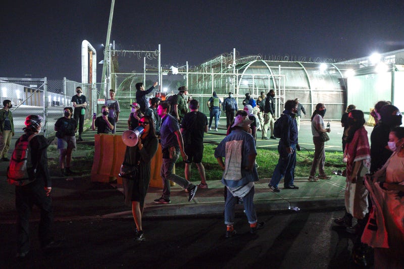 Protesters gather outside the Delaney Hall Detention Facility during protests over federal immigration enforcement raids on Thursday, June 12, 2025, in Newark