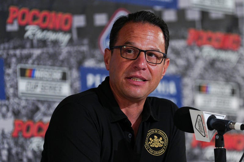 Pennsylvania Gov. Josh Shapiro talks to the media prior to a NASCAR Cup Series auto race at Pocono Raceway, Sunday, June 22, 2025, in Long Pond, Pa. 