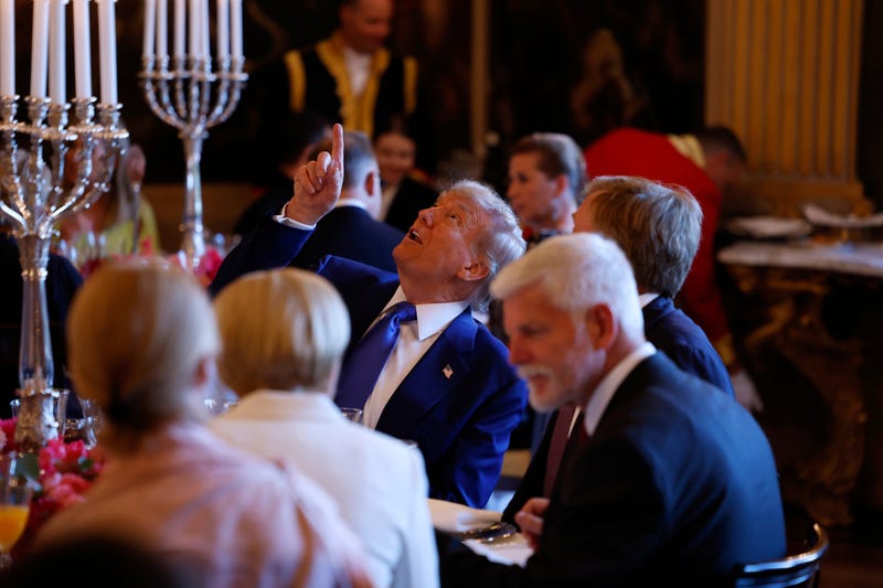 President Donald Trump, center, speaks with Netherland's King Willem Alexander during a dinner at the Paleis Huis ten Bosch ahead of the NATO summit in The Hague, Netherlands, Tuesday, June 24, 2025. 