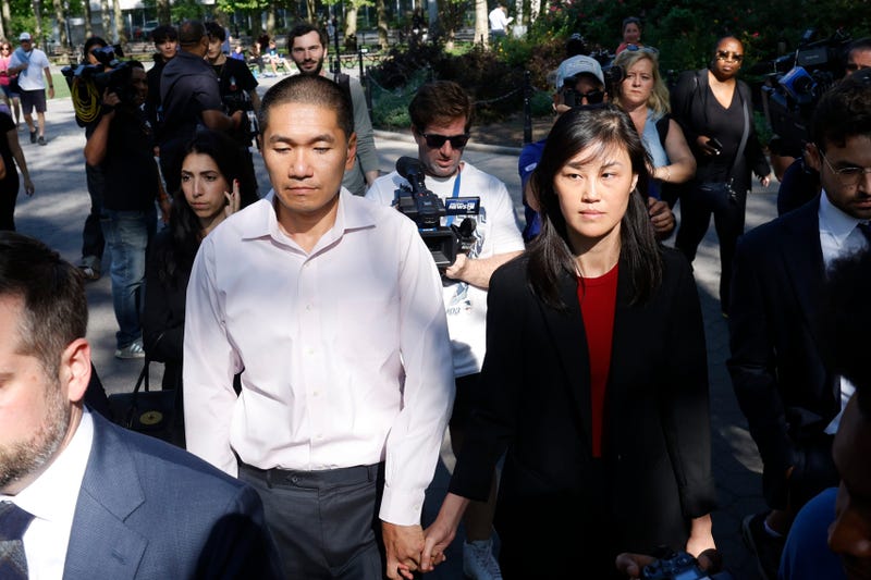 Former New York Governor Kathy Hochul aide Linda Sun, right, and her husband, Christopher Hu, leave Brooklyn Federal Court after their arraignment, Sept. 3, 2024, in New York