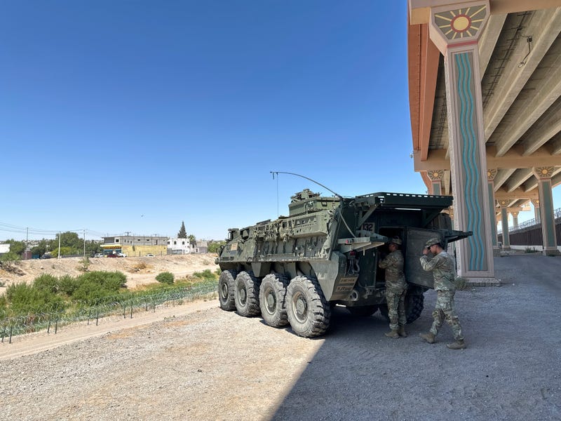 A military transport and surveillance vehicle is parked in a newly designated national defense area on June 11, 2025, along the southern U.S. border in El Paso, Texas.