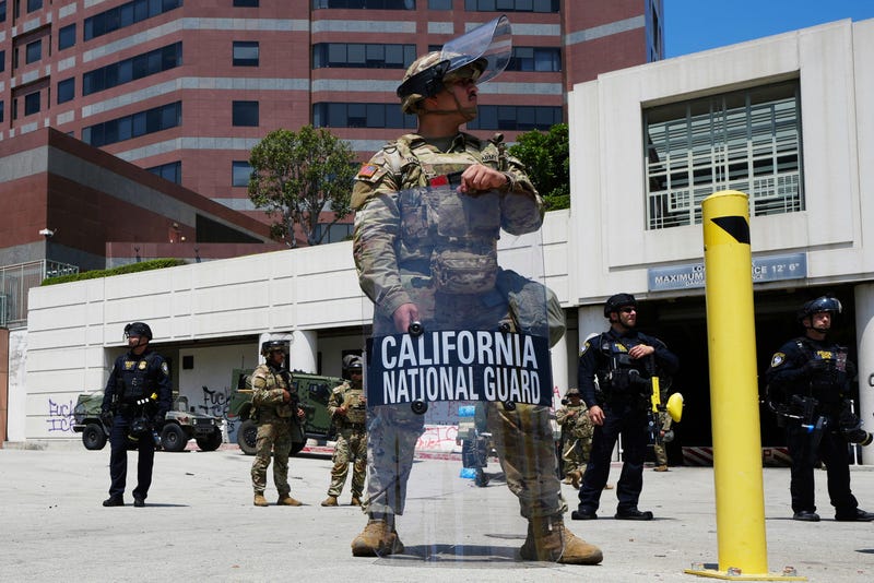 A California National Guardsmen stands to protect federal buildings, June 10, 2025, in Los Angeles.