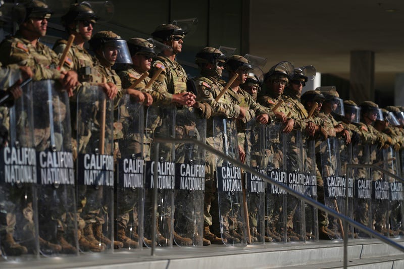 FILE - California National Guard are positioned at the Federal Building, June 10, 2025, in downtown Los Angeles