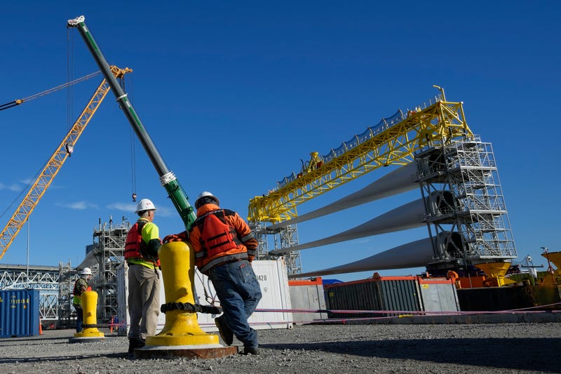 A generator and its blades are prepared for transport to the open ocean for the South Fork Wind farm in New London, Conn., Dec. 4, 2023.