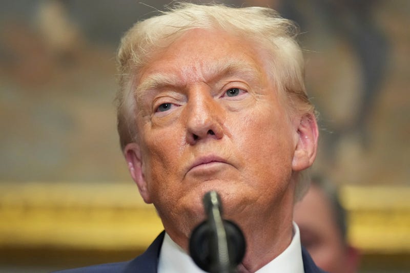President Donald Trump listens during an event to sign an executive order restarting the Presidential Fitness Test in public schools, Thursday, July 31, 2025, in the Roosevelt Room of the White House in Washington
