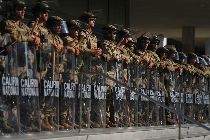 FILE - California National Guard members are positioned at the Federal Building in downtown Los Angeles, on June 10, 2025.