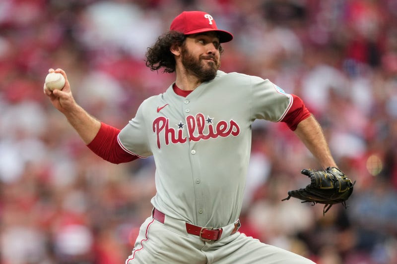 Philadelphia Phillies pitcher Jordan Romano throws during the seventh inning of a baseball game against the Cincinnati Reds on Aug. 11, 2025, in Cincinnati. 