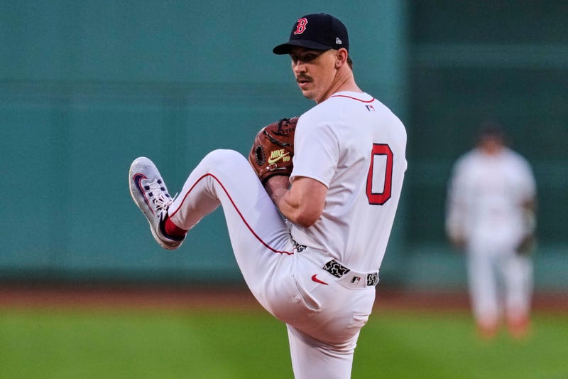 Boston Red Sox pitcher Walker Buehler delivers during the first inning of a baseball game against the Baltimore Orioles at Fenway Park, Tuesday, Aug. 19, 2025, in Boston. 