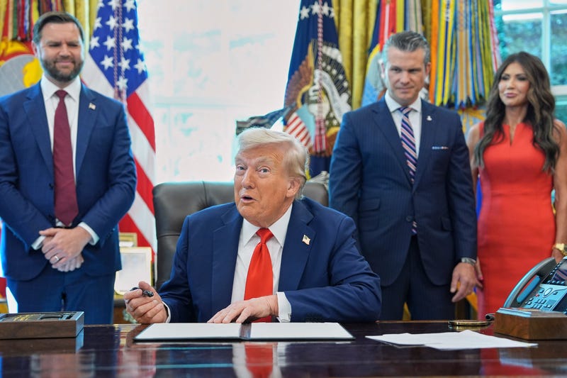 President Donald Trump speaks as he signs executive orders in the Oval Office of the White House, Monday, Aug. 25, 2025, in Washington
