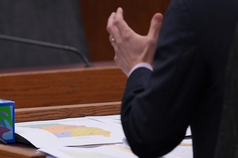 Missouri state Rep. Dirk Deaton, R-Seneca, sponsor of a bill that would redraw the state's U.S. House districts, testifies as a proposed map is seen on the table during a committee hearing on the bill , hursday, Sept. 4, 2025, in Jefferson City, Mo.