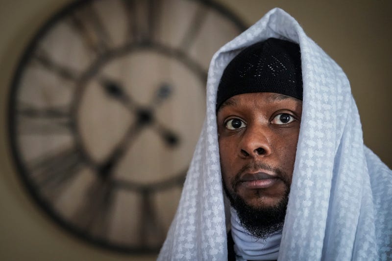 Myon Burrell poses for a photo at his home in Minneapolis, Dec. 17, 2020, two days after his release from prison.