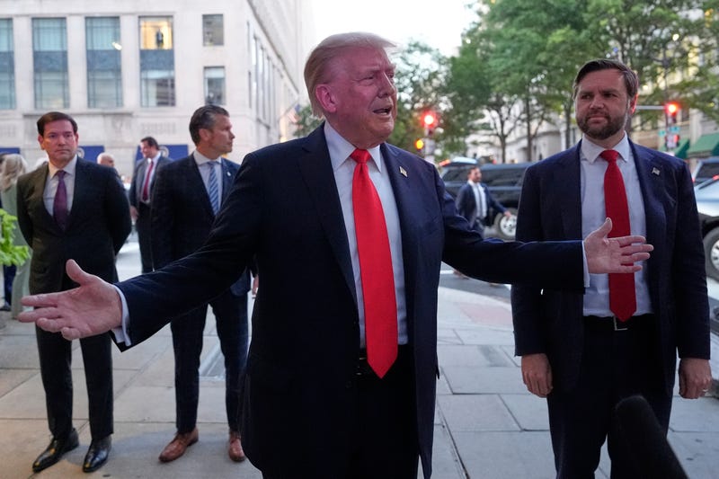 President Donald Trump speaks to reporters before he enters a restaurant near the White House, Tuesday, Sept. 9, 2025, in Washington, to have dinner with Secretary of State Marco Rubio, Defense Secretary Pete Hegseth and Vice President JD Vance.