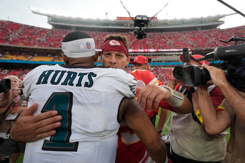 Kansas City Chiefs quarterback Patrick Mahomes and Philadelphia Eagles quarterback Jalen Hurts (1) hug following an NFL football game Sunday, Sept. 14, 2025, in Kansas City, Mo. 