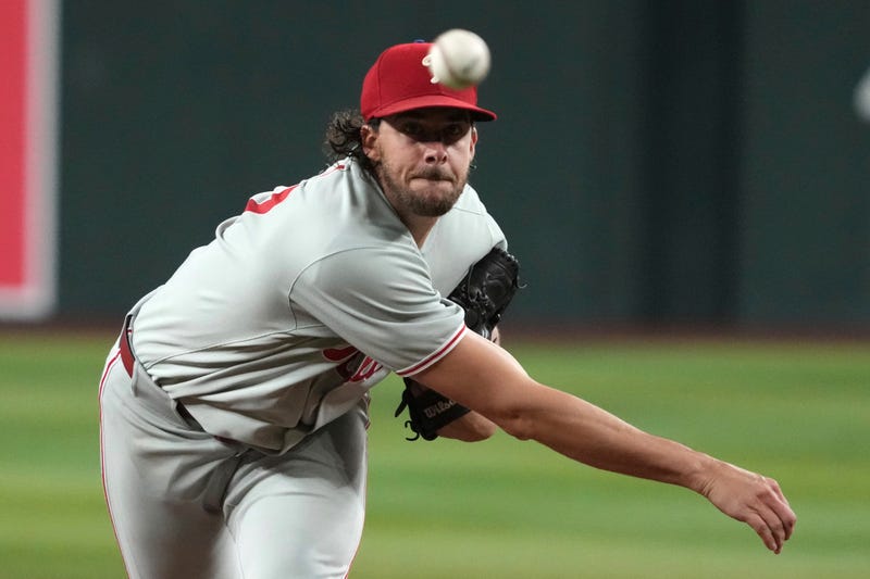 Philadelphia Phillies pitcher Aaron Nola throws against the Arizona Diamondbacks in the first inning of a baseball game, Saturday, Sept. 20, 2025, in Phoenix.