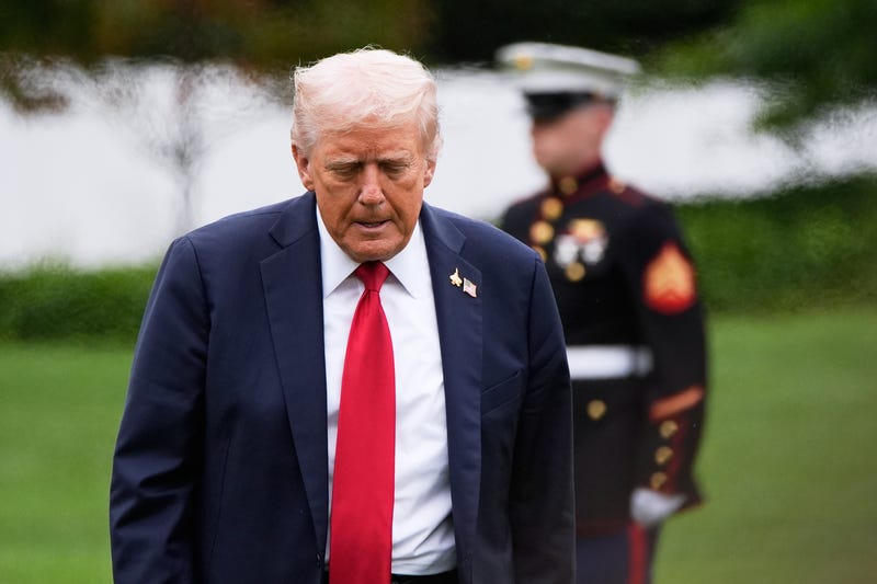 President Donald Trump walks from Marine One after arriving on the South Lawn of the White House, Tuesday, Sept. 30, 2025, in Washington. 