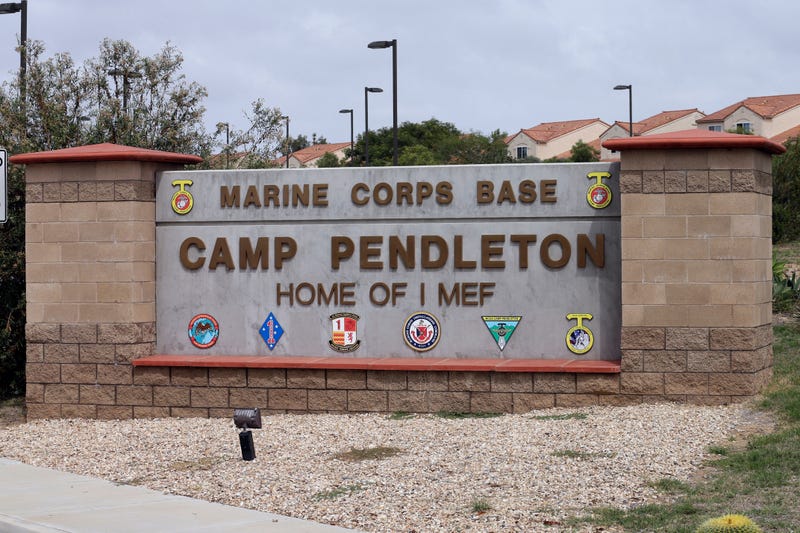 FILE - The entrance to Marine Corps base Camp Pendleton is seen on Sept. 22, 2015, in Oceanside, Calif.