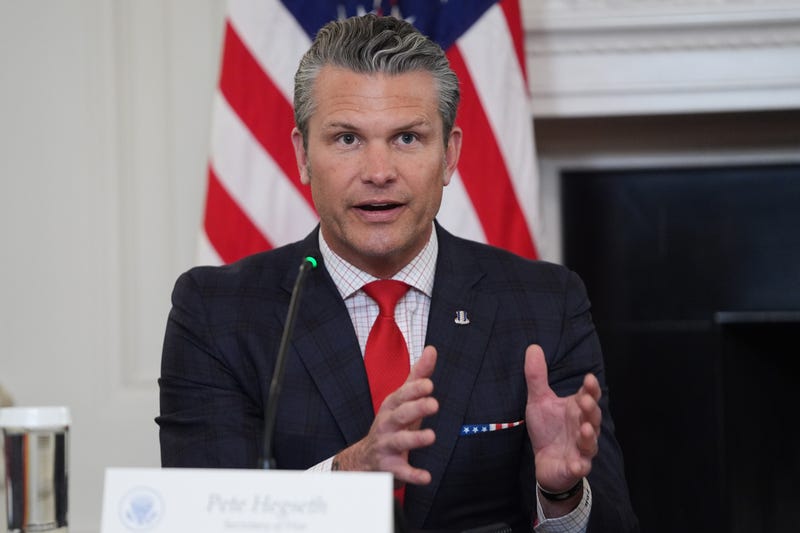 Defense Secretary Pete Hegseth answers a question from a reporter during a roundtable on criminal cartels in the State Dining Room of the White House, Thursday, Oct. 23, 2025, in Washington.