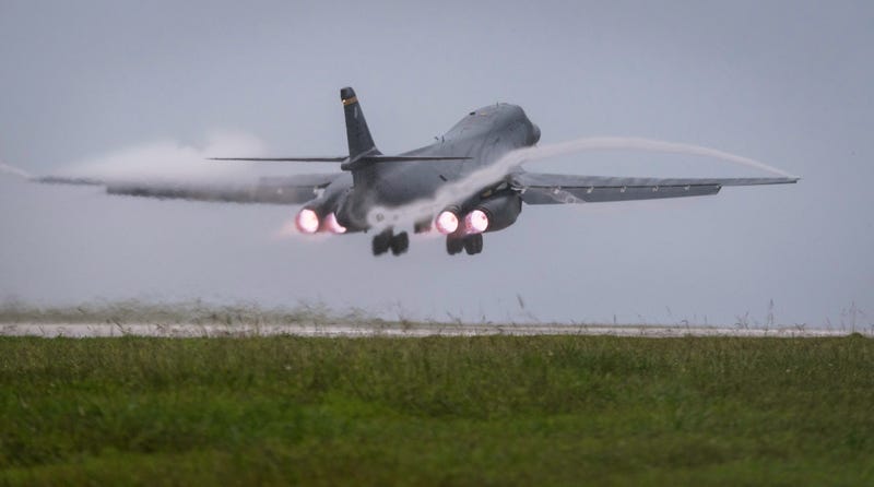FILE - In this photo released by the U.S. Air Force, a Air Force B-1B Lancer bomber takes off from Andersen Air Force Base, Guam, to fly a mission with two Koku Jieitai (Japan Air Self-Defense Force) F-15s, Sept. 9, 2017.