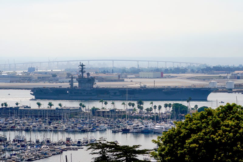 FILE - The USS Nimitz (CVN 68) departs San Diego Bay, Aug. 19, 2023, at Mission Beach, in San Diego.