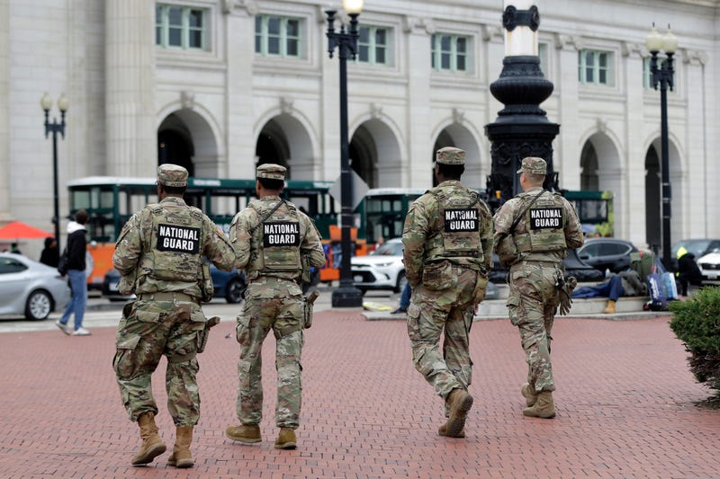 National Guard soldiers patrol at Union Station, Tuesday, Oct. 28, 2025, in Washington.